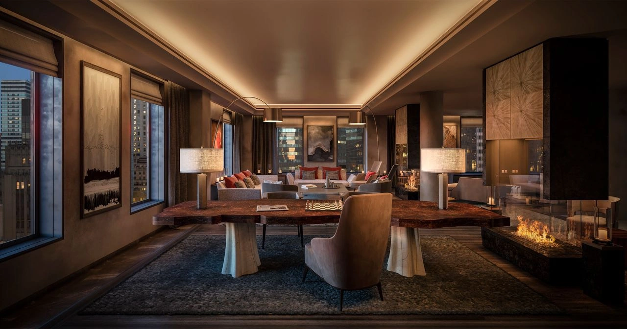 Past the grand foyer is a dining area with quartz countertops and a living room with city views. Photo: Douglas Elliman.