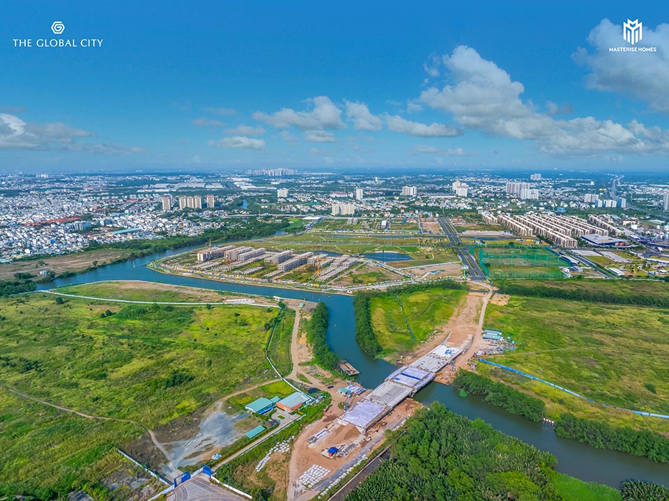 Panoramic view of Love Bay, with cool green canal park and completed infrastructure.